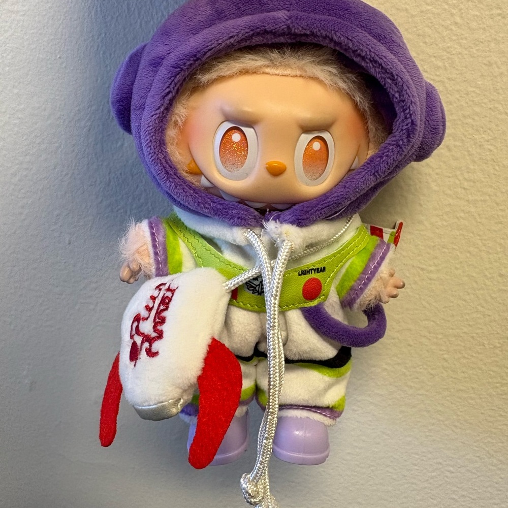 Purple and White Plush Toy with Red Accents doll not included